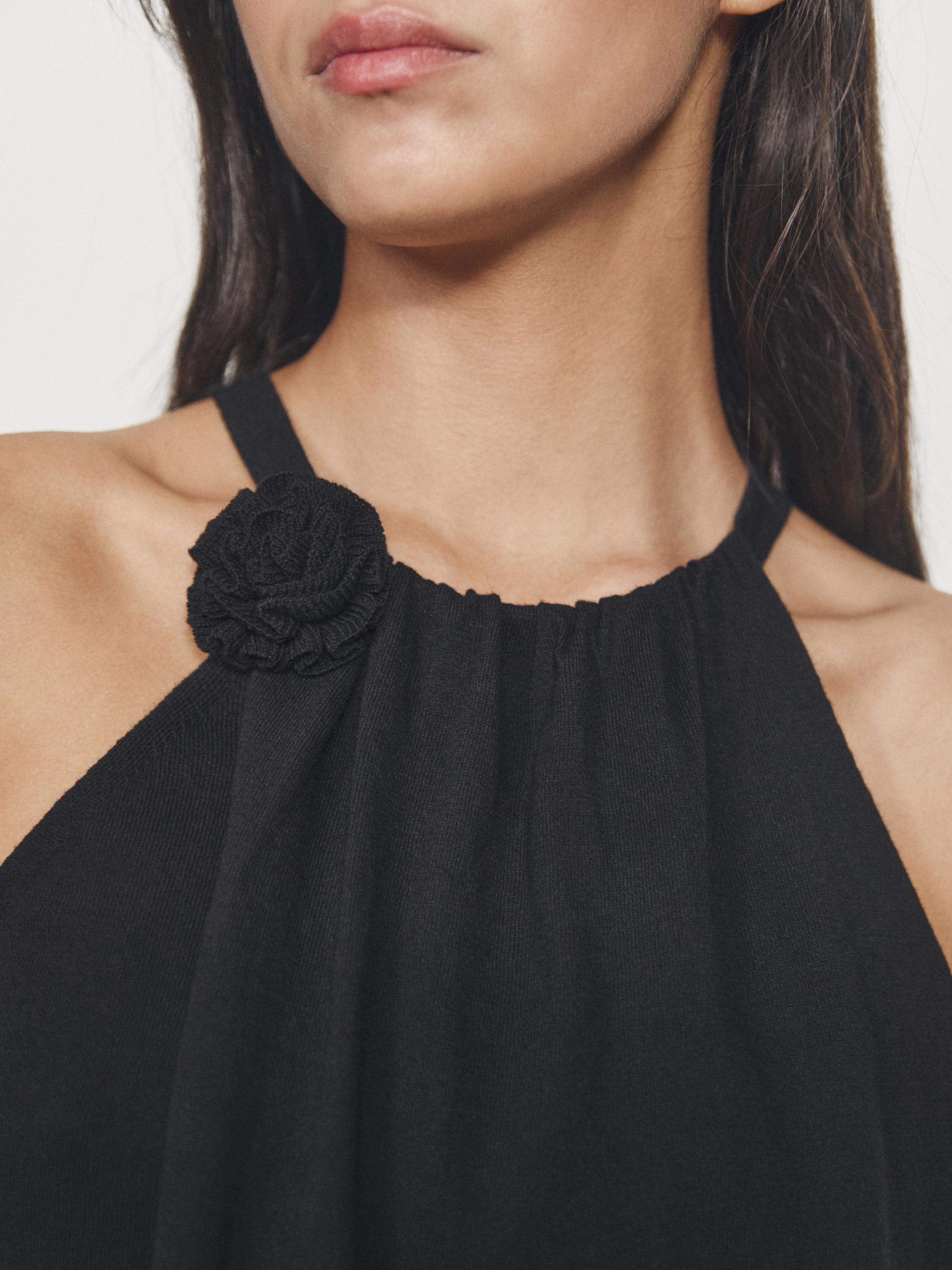 Top en maille de coton avec fleur